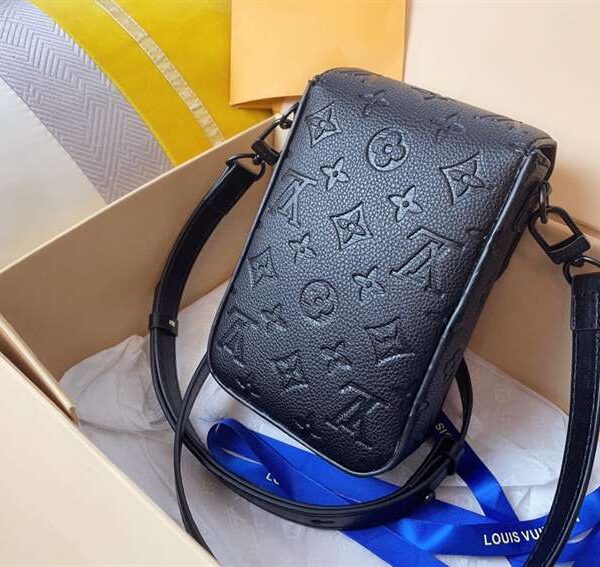 Louis Vuitton S-Lock Vertical wallet Taurillon Monogram replica