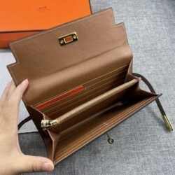 LV wallet in burgundy and Hermes wallet in tan brown