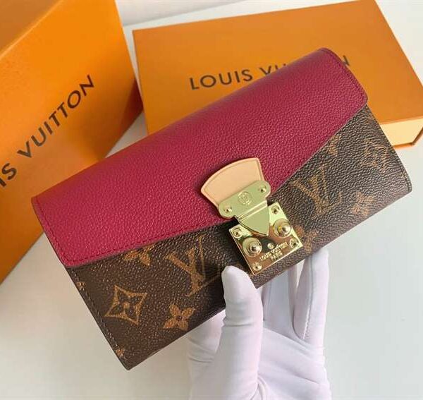 LV wallet in burgundy and Hermes wallet in tan brown