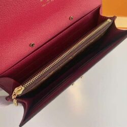 LV wallet in burgundy and Hermes wallet in tan brown